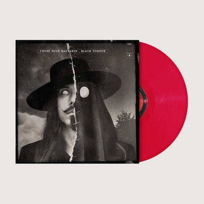 Vinyl record with a black and white cover featuring a person in a hat and red disc